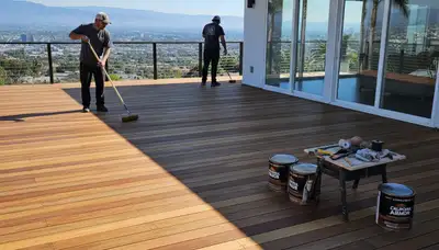 Professional deck staining in Los Angeles, CA enhancing wood durability and color with UV protection