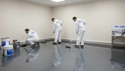 Epoxy floor coating in Los Angeles CA garage by professional painters for durable, high-gloss finish
