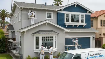 Professional house painters finishing exterior home in Los Angeles CA